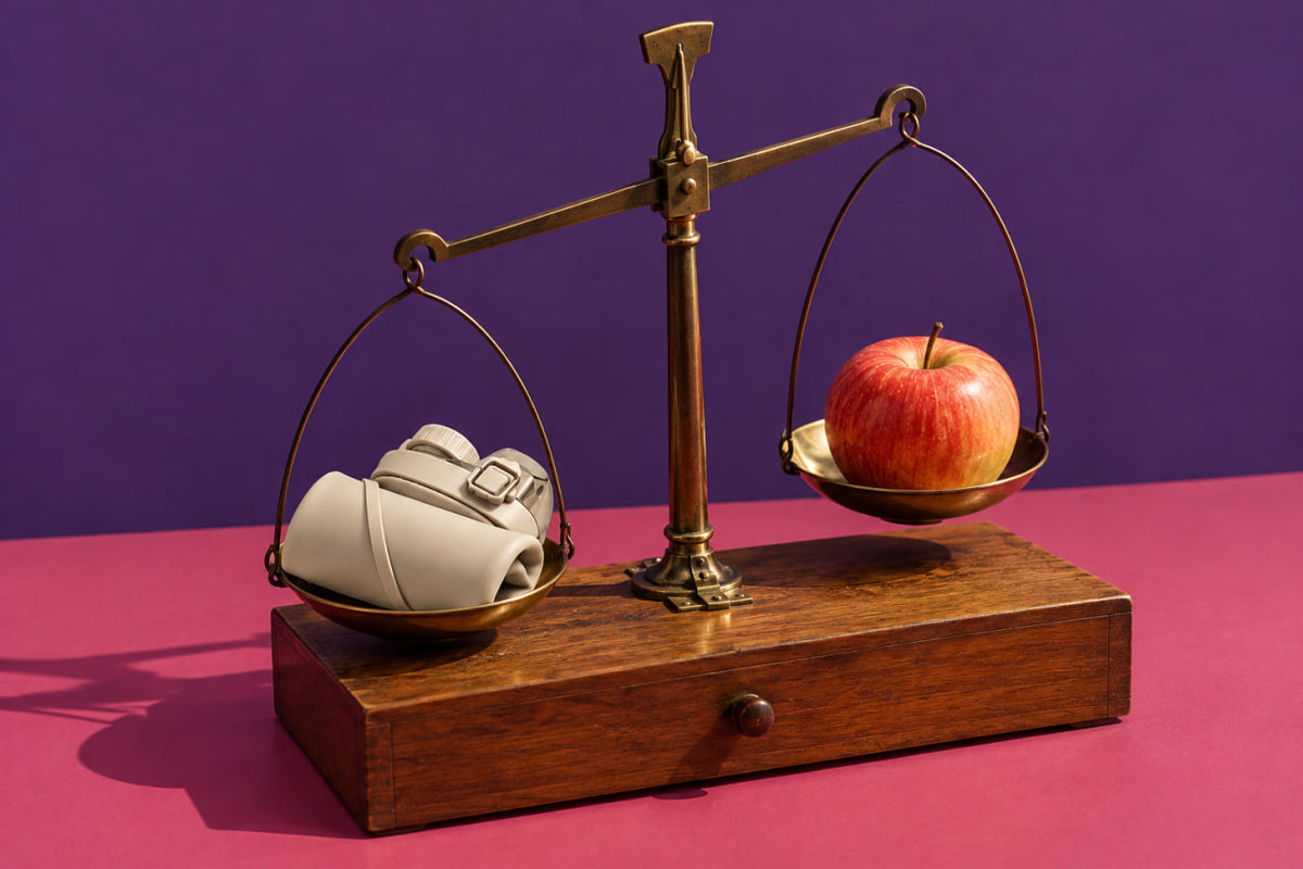 Folded NEXFLO bottle on a balance scale beside an apple